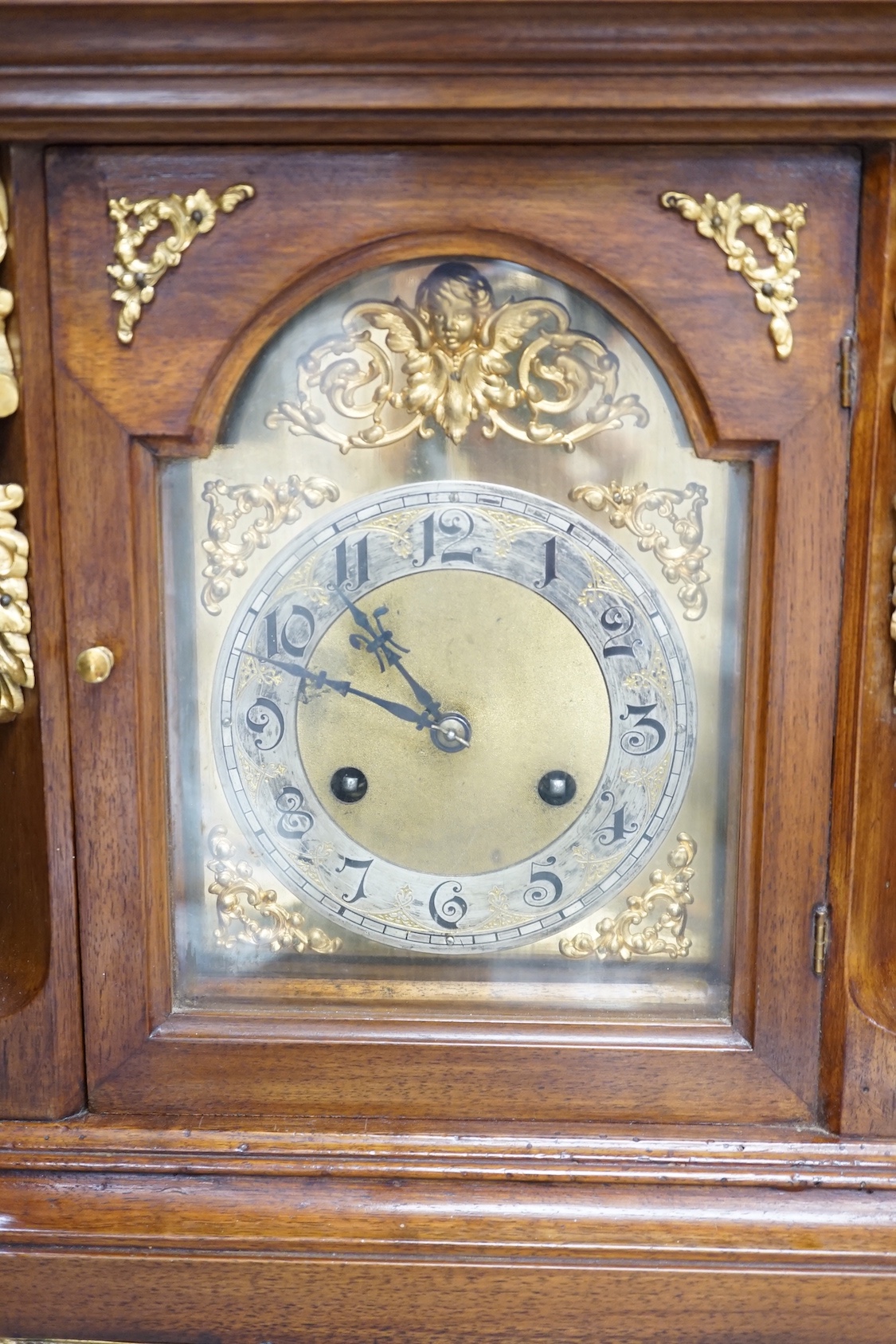 A reproduction gilt metal mounted bracket clock, 55cm